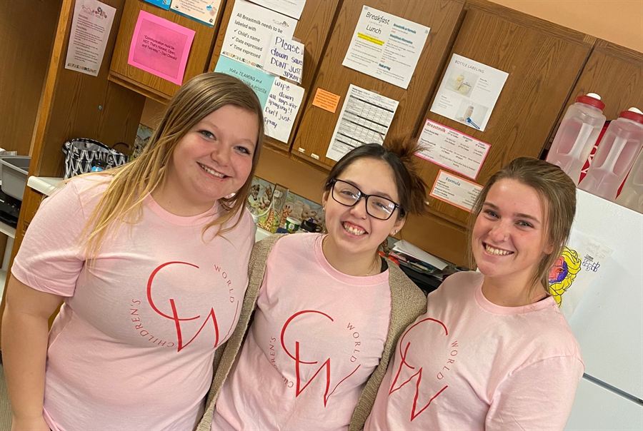 Children’s World staff in matching shirts